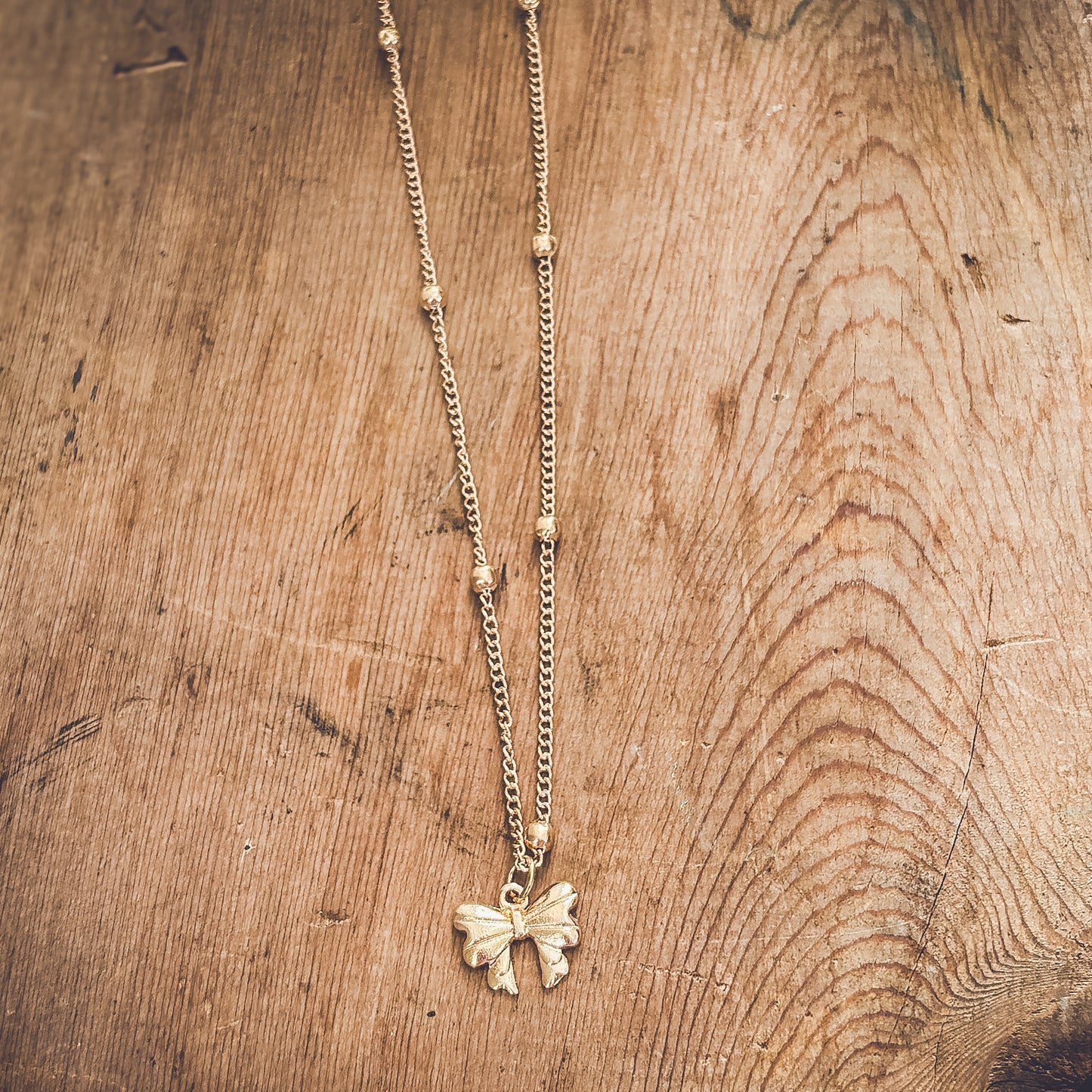 Adorable Gold Bow Necklace