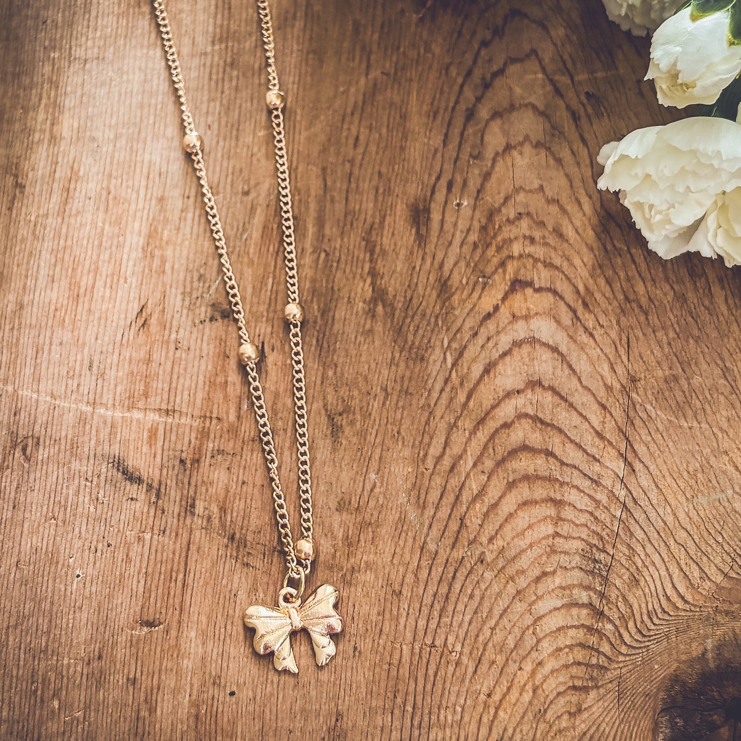 Adorable Gold Bow Necklace